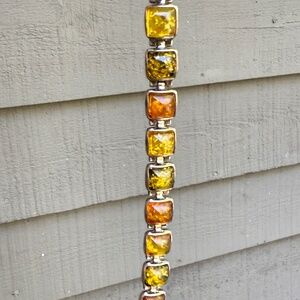 Vintage Tri Colored Amber bracelet framed in Sterling Silver